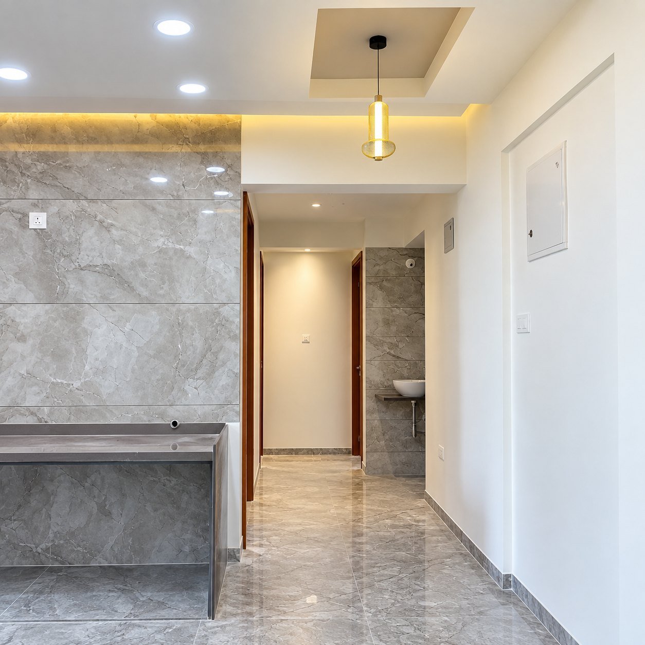 Interior passage with a marble-look wall panel and polished floor
